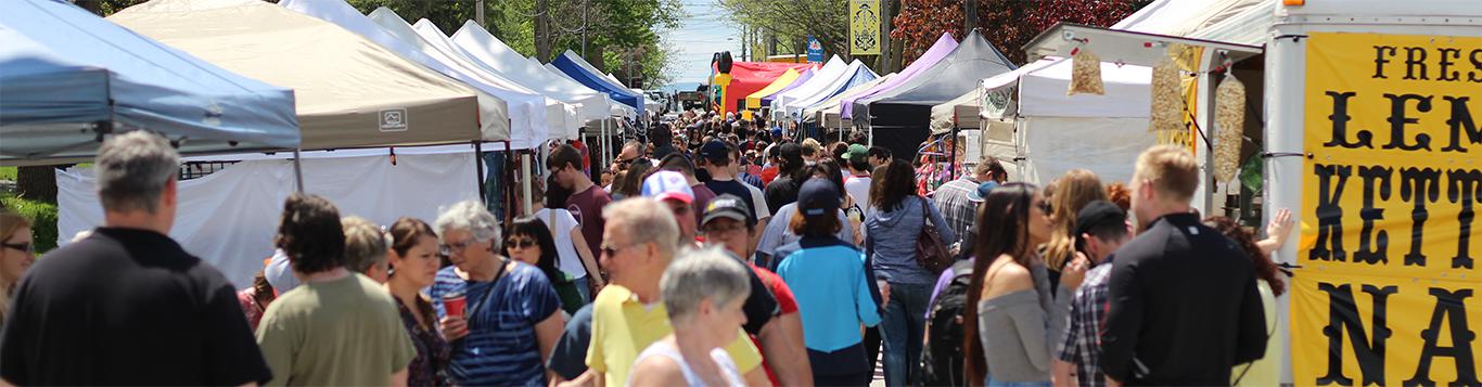 Crowds and vendors filing Beeton Main Street